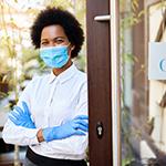 Small business owner wearing mask